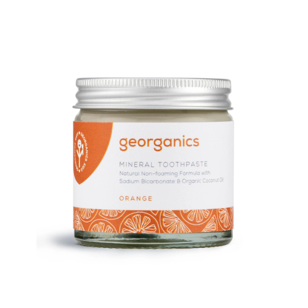 A pasta de dentes natural de laranja, sem flúor, da Georganics limpa e remove naturalmente manchas superficiais. Pasta de dentes sem espuma.