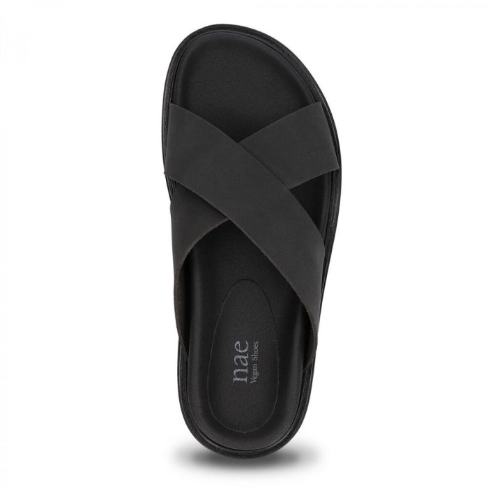 As sandálias HAZEL BLACK são abertas e planas com tiras cruzadas e sola acolchoada feitas em nobuk vegan. Sustentáveis, leves e sem crueldade animal.