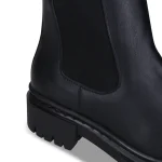 Botas Vikki Black – um clássico intemporal com um toque moderno, fabricadas com materiais de alta qualidade e sustentáveis, estas botas são inovadoras, sem crueldade e resistentes à água.